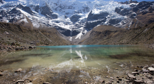Swimming in an ice cold glacier lake at 4000 metres in the Peruvian Andes